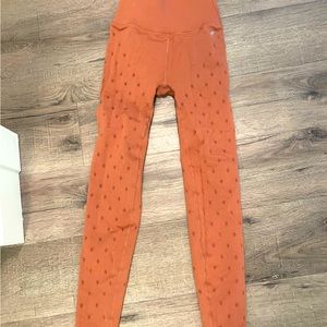 Salmon colored fabletics leggings